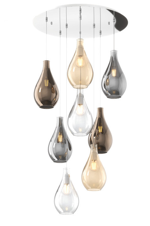 Collezione di lampade a sospensione composte da una o più gocce in vetro soffiato e lampade da parete disponibili nelle versioni con vetri piccoli.