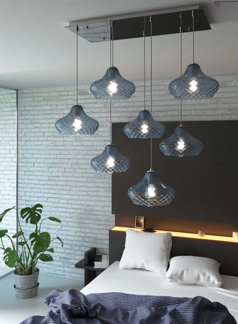 Collezione di lampade a sospensione composte da uno o più elementi in vetro soffiato regolabili in altezza.
