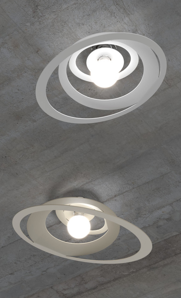 Collezione di lampade a sospensione e plafoniera, composta da una struttura cromata che sostiene un diffusore metallico realizzato con tecnologia laser.