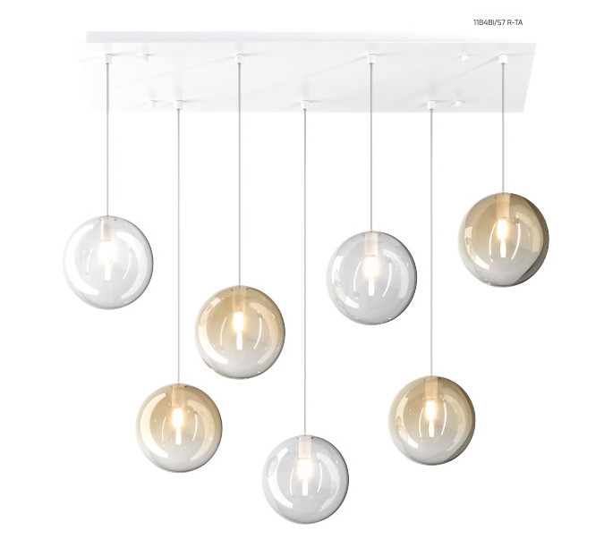 Collezione di lampade a sospensione composta da una o più sfere in vetro pirex soffiato regolabili in altezza e disponibili in diverse finiture.