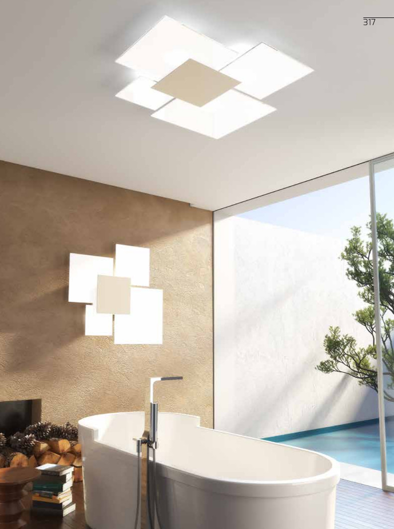 Collezione di lampade da parete o da plafone con struttura metallica verniciata bianca e piastra frontale disponibile in diverse finiture.